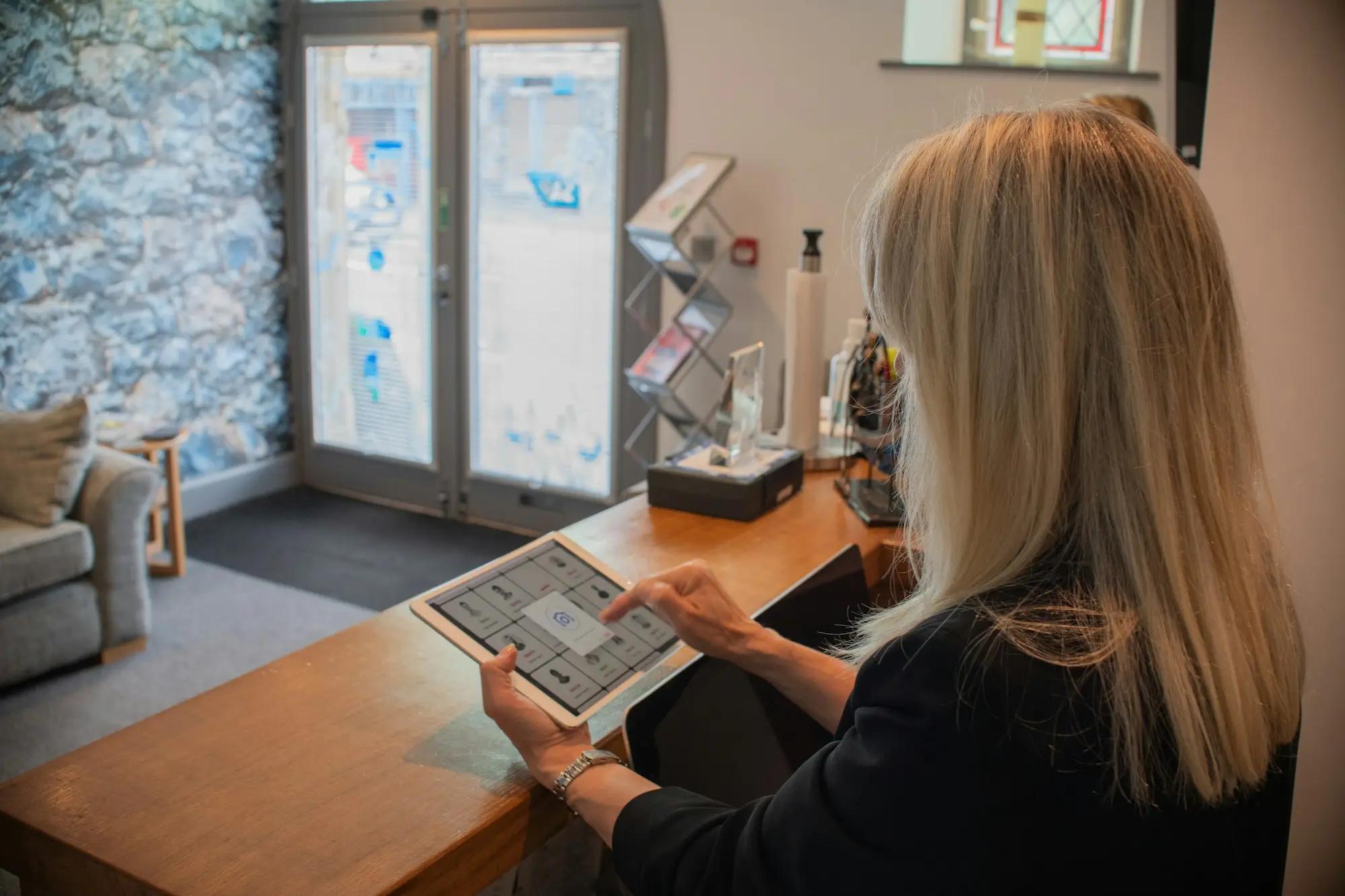 Accountant meeting a business owner with a tablet
