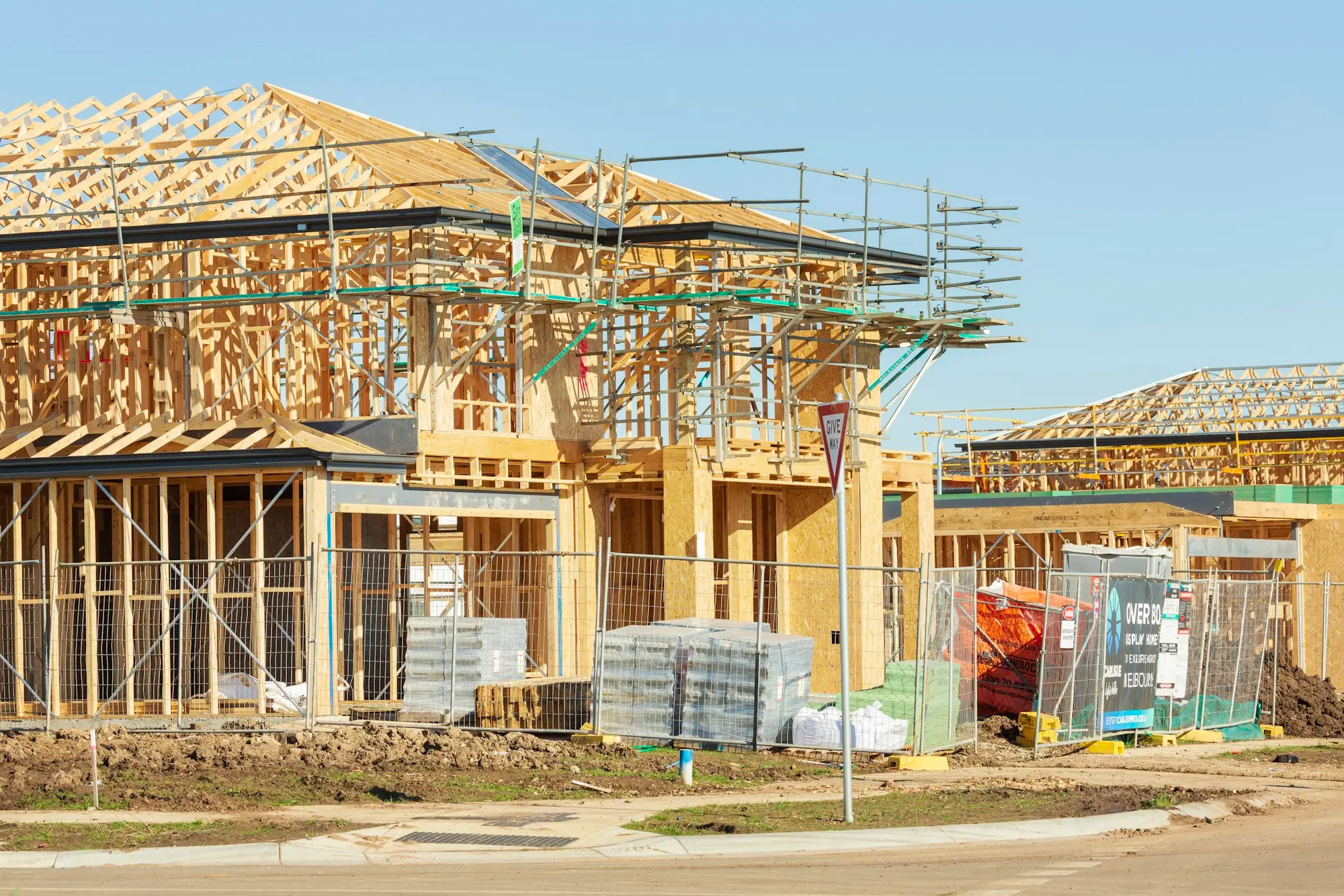 House frames under construction on a building site