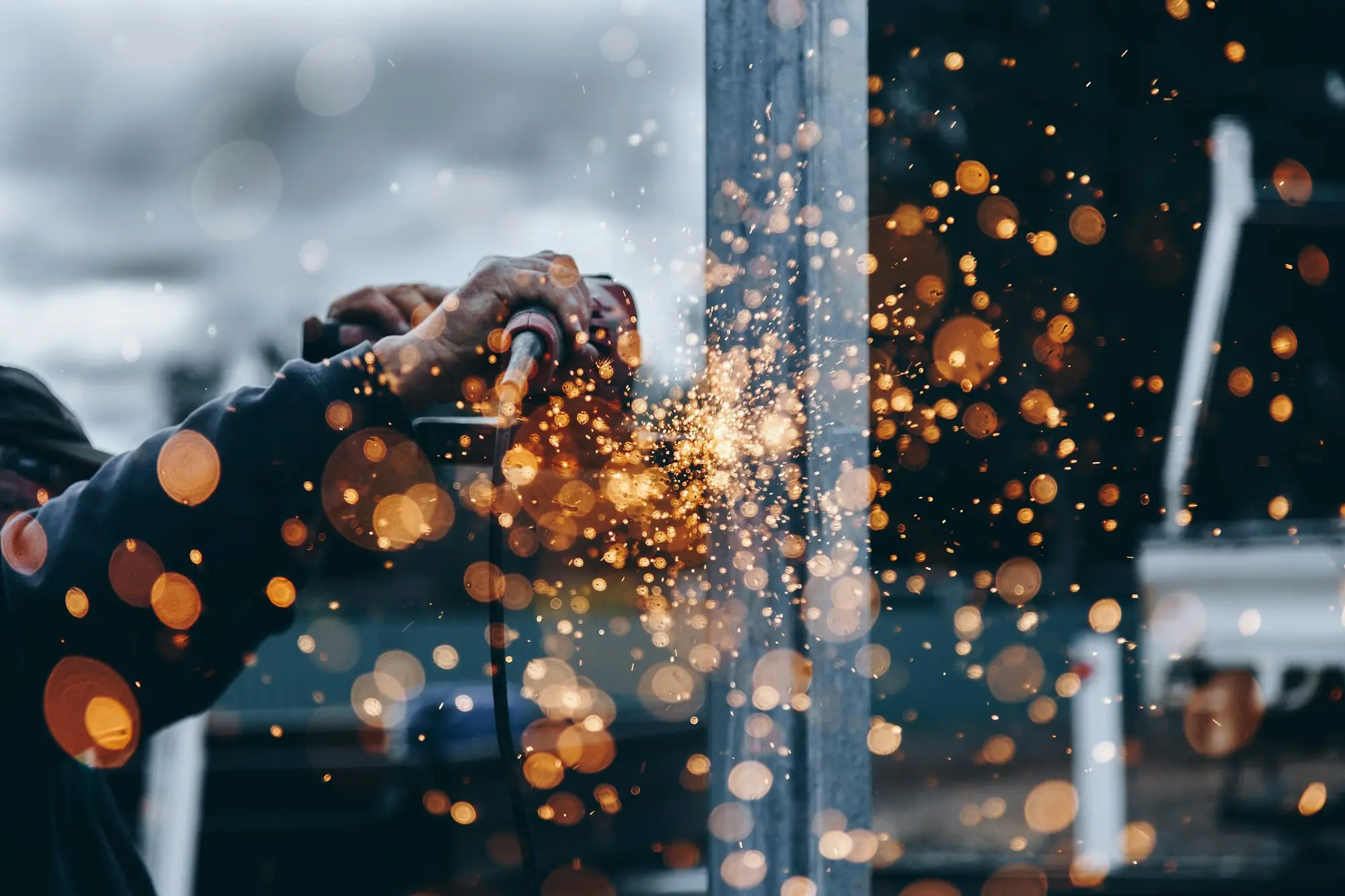 Sparks flying in a fabrication workshop filling a big order
